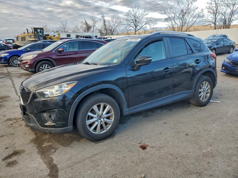 MAZDA CX-5 TOURI 2015 with VIN JM3KE2CY7F0501894 - Photo from auction