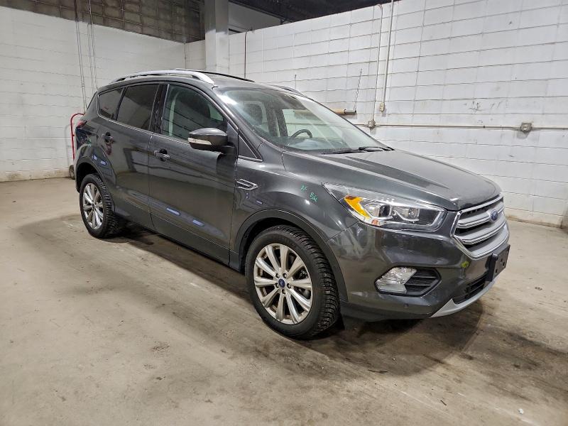 Photo 4 from auction – 2017 FORD ESCAPE TIT with VIN 1FMCU9J90HUE16178