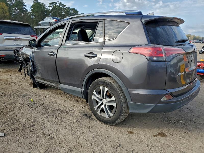 Photo 2 from auction – 2017 TOYOTA RAV4 with VIN JTMZFREV8HJ147994
