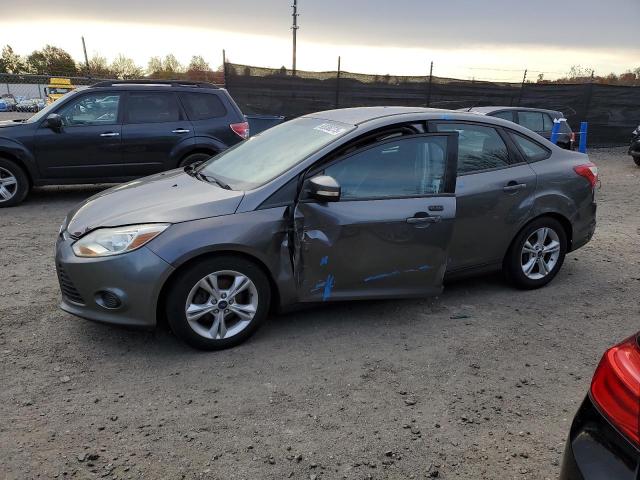 FORD FOCUS SE 2014 with VIN 1FADP3F24EL410576 - Photo from auction