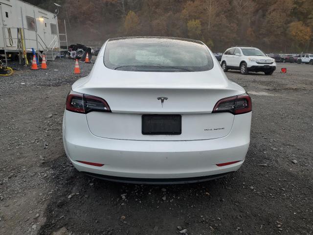 Photo 6 from auction – 2021 TESLA MODEL 3 with VIN 5YJ3E1EB6MF974801
