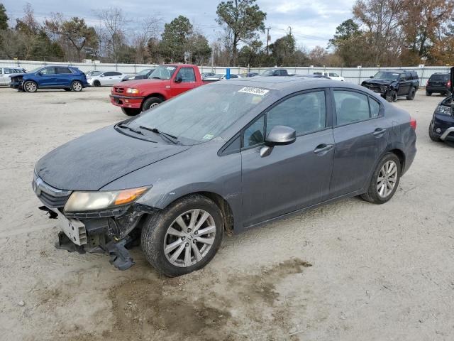 HONDA CIVIC EXL 2012 with VIN 2HGFB2F97CH579933 - Photo from auction