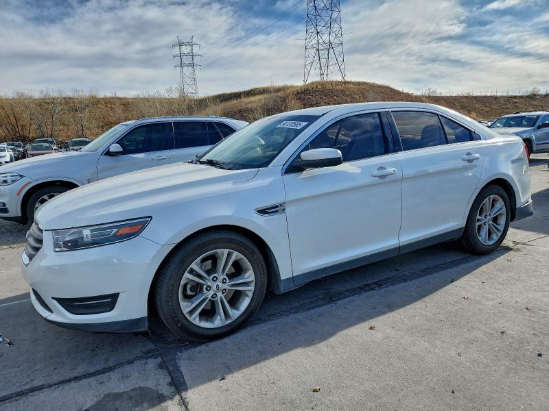 FORD TAURUS SEL 2015 with VIN 1FAHP2E99FG207655 - Photo from auction