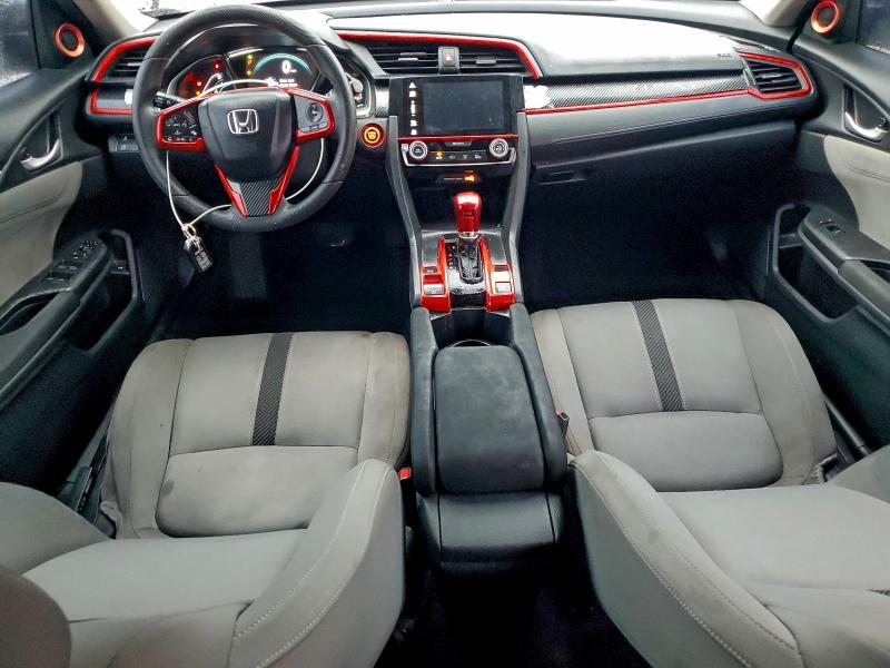 Photo 8 from auction – 2018 HONDA CIVIC EX with VIN 19XFC2F73JE038736