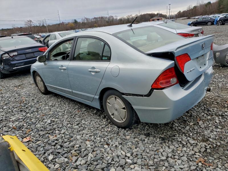 Photo 2 from auction – 2006 HONDA CIVIC HYBR with VIN JHMFA36216S021503