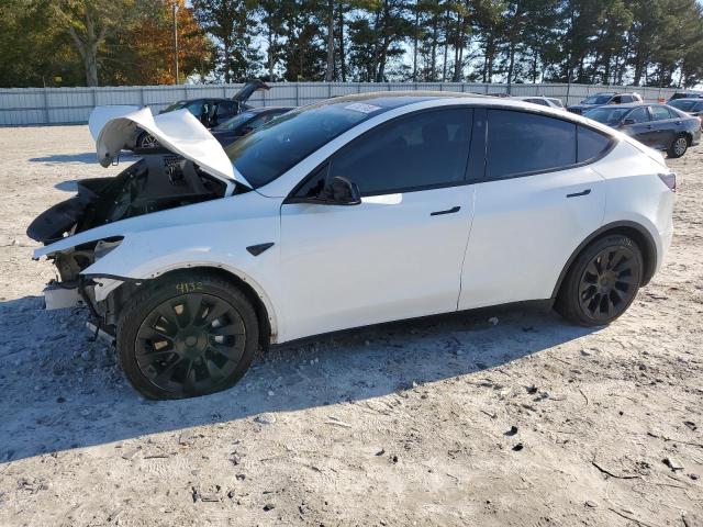 TESLA MODEL Y 2022 with VIN 7SAYGDEE6NF329954 - Photo from auction