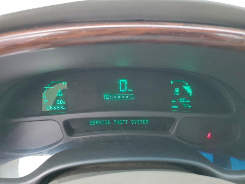 Photo 9 from auction – 2001 CADILLAC DEVILLE with VIN 1G6KD54Y21U102181
