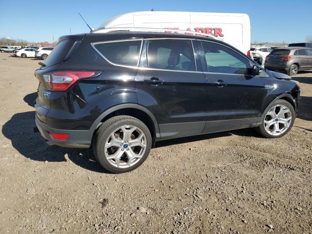Photo 3 from auction – 2018 FORD ESCAPE TIT with VIN 1FMCU9J92JUC85518
