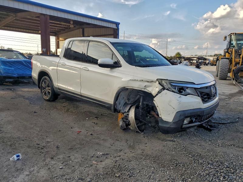 Photo 4 from auction – 2019 HONDA RIDGELINE with VIN 5FPYK3F17KB022748