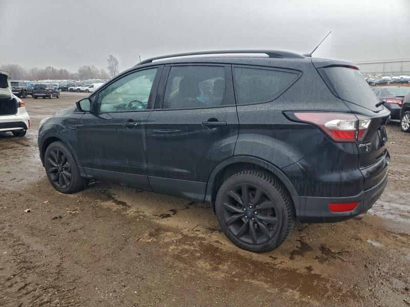 Photo 2 from auction – 2017 FORD ESCAPE SE with VIN 1FMCU9GDXHUD52257