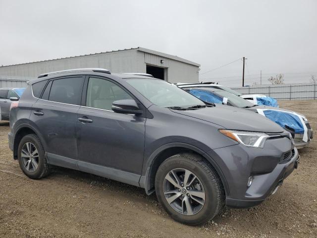Photo 4 from auction – 2016 TOYOTA RAV4 XLE with VIN JTMRFREVXGJ102053
