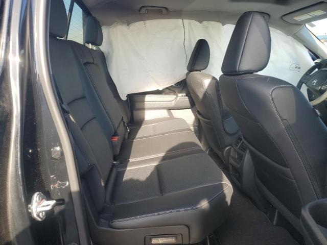 Photo 10 from auction – 2023 HONDA RIDGELINE with VIN 5FPYK3F56PB034030