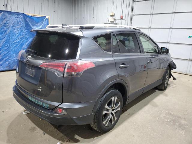Photo 3 from auction – 2016 TOYOTA RAV4 LE with VIN JTMBFREV2GD185073