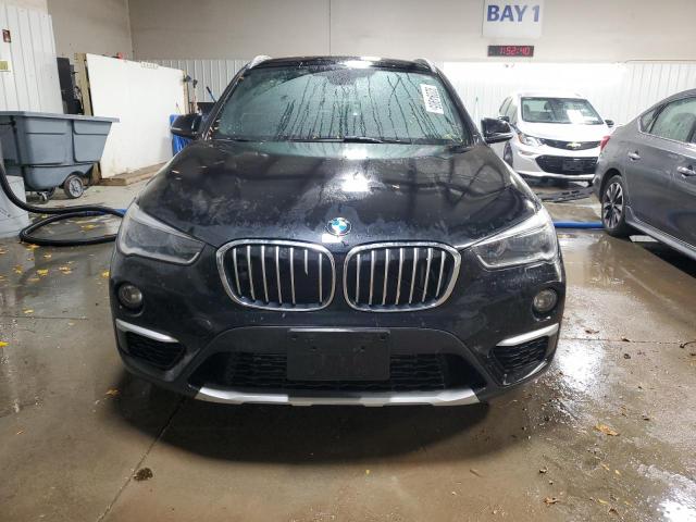 Photo 5 from auction – 2017 BMW X1 XDRIVE2 with VIN WBXHT3C39H5F82637