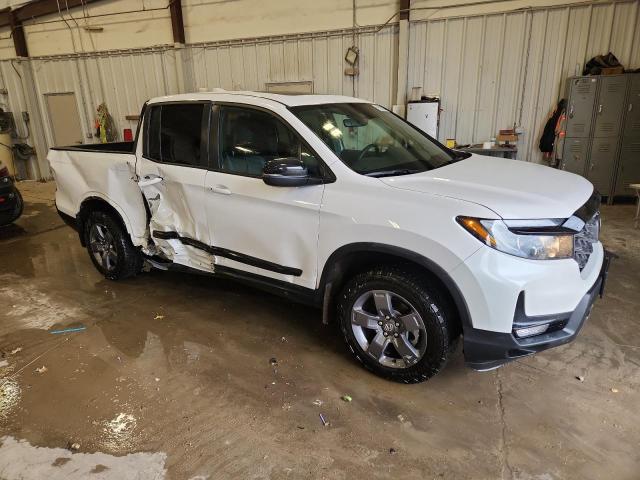 Photo 4 from auction – 2025 HONDA RIDGELINE with VIN 5FPYK3F61SB009828