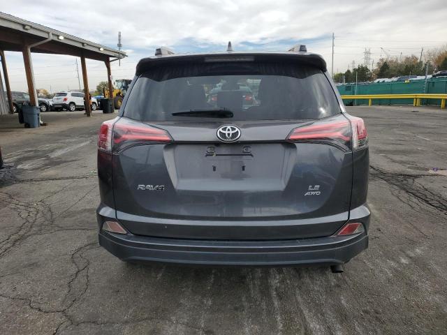 Photo 6 from auction – 2018 TOYOTA RAV4 LE with VIN JTMBFREVXJD232549