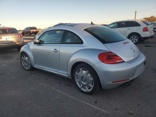 Photo 2 from auction – 2013 VOLKSWAGEN BEETLE with VIN 3VWJP7AT2DM666374