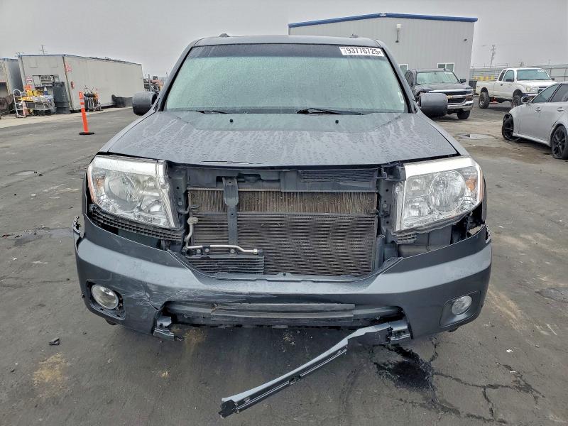 Photo 5 from auction – 2011 HONDA PILOT TOUR with VIN 5FNYF4H95BB102510