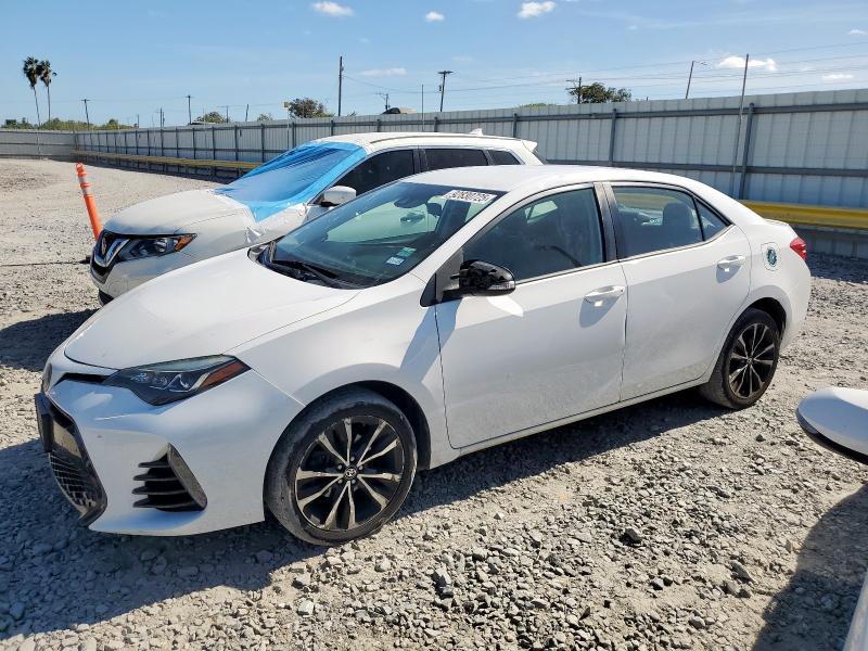 TOYOTA COROLLA L 2018 with VIN 5YFBURHE3JP777975 - Photo from auction