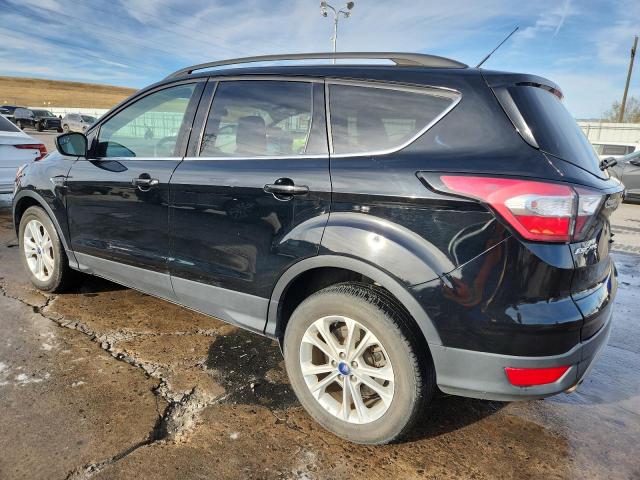 Photo 2 from auction – 2018 FORD ESCAPE SE with VIN 1FMCU9GD4JUA73909