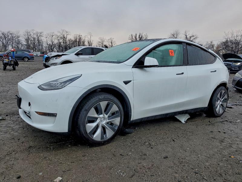 TESLA MODEL Y 2022 с VIN 7SAYGDEE8NF400636 - Снимка от търг