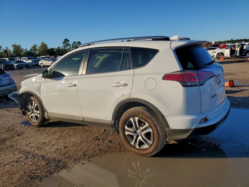 Photo 2 from auction – 2018 TOYOTA RAV4 LE with VIN JTMZFREV2JJ190846