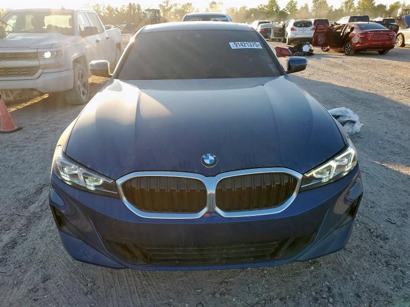 Photo 5 from auction – 2023 BMW 330I with VIN 3MW69FF02P8D02641