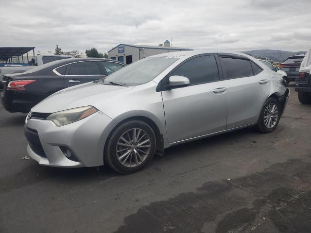 TOYOTA COROLLA L 2015 with VIN 2T1BURHE5FC261995 - Photo from auction