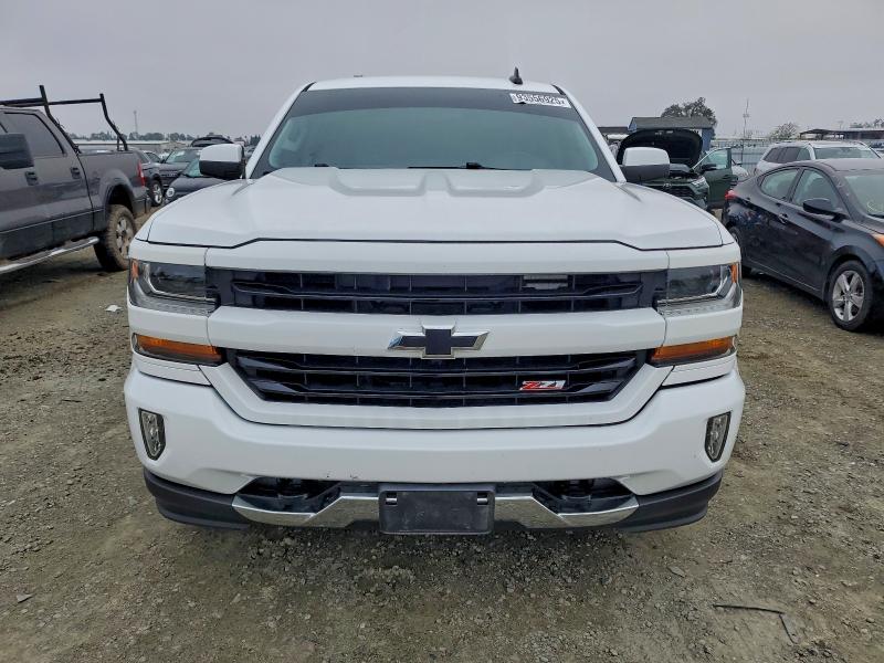 Photo 5 from auction – 2018 CHEVROLET SILVERADO with VIN 3GCUKREC8JG590450