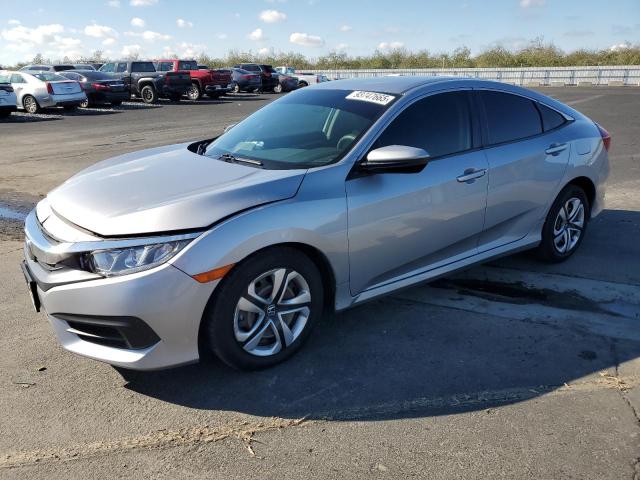 HONDA CIVIC LX 2018 with VIN 2HGFC2F55JH581509 - Photo from auction