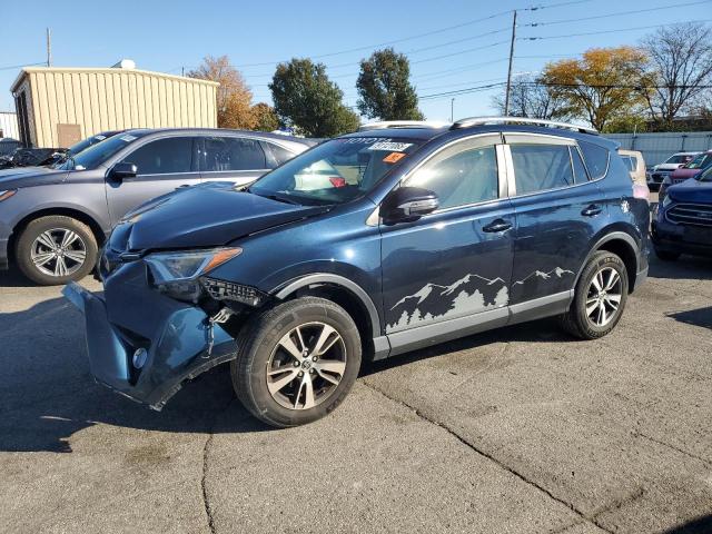TOYOTA RAV4 XLE 2017 with VIN JTMRFREV5HJ704392 - Photo from auction
