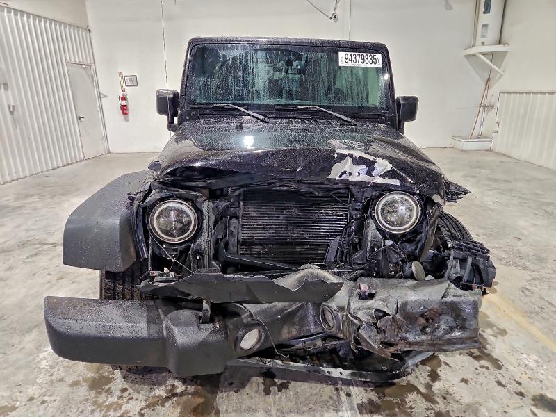 Photo 5 from auction – 2016 JEEP WRANGLER U with VIN 1C4BJWDG8GL273468