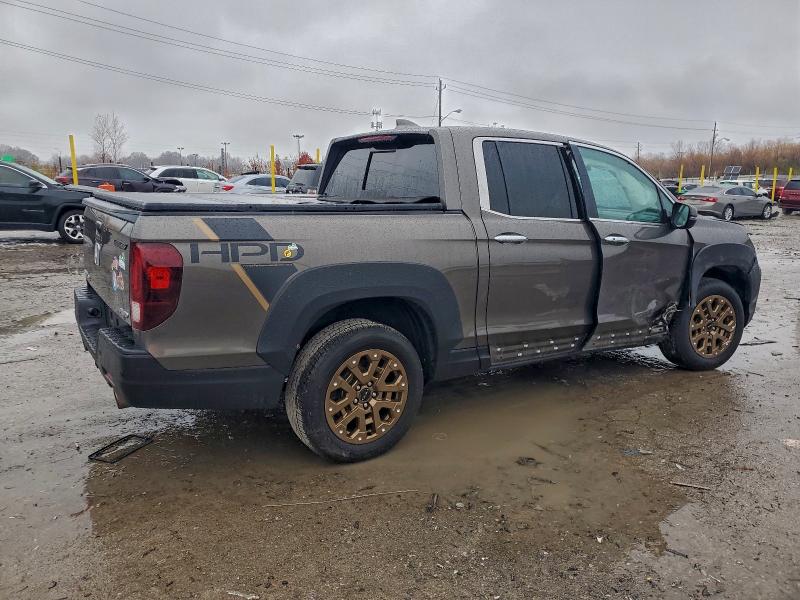 Photo 3 from auction – 2023 HONDA RIDGELINE with VIN 5FPYK3F74PB007135