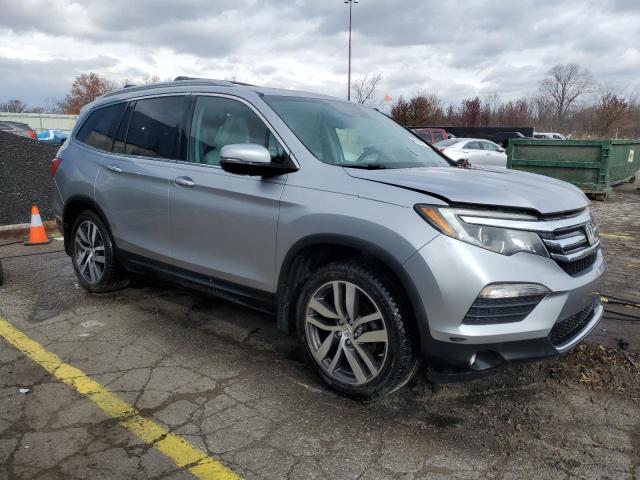 Photo 4 from auction – 2016 HONDA PILOT ELIT with VIN 5FNYF6H01GB059823
