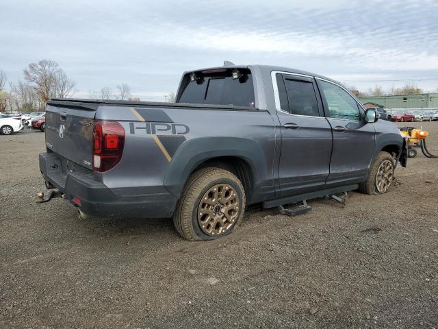 Photo 3 from auction – 2021 HONDA RIDGELINE with VIN 5FPYK3F50MB023052