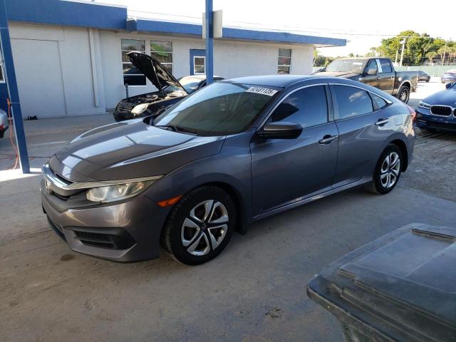 Photo 1 from auction – 2018 HONDA CIVIC LX with VIN 19XFC2F57JE034199