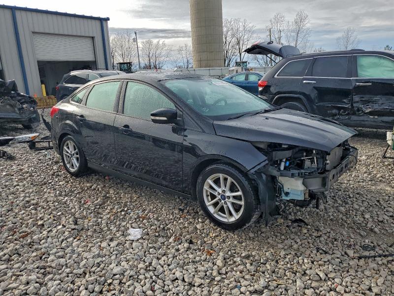 Photo 4 from auction – 2016 FORD FOCUS SE with VIN 1FADP3FE9GL200052