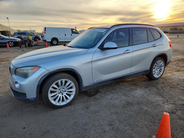 BMW X1 2014 with VIN WBAVM1C57EVW52208 - Photo from auction