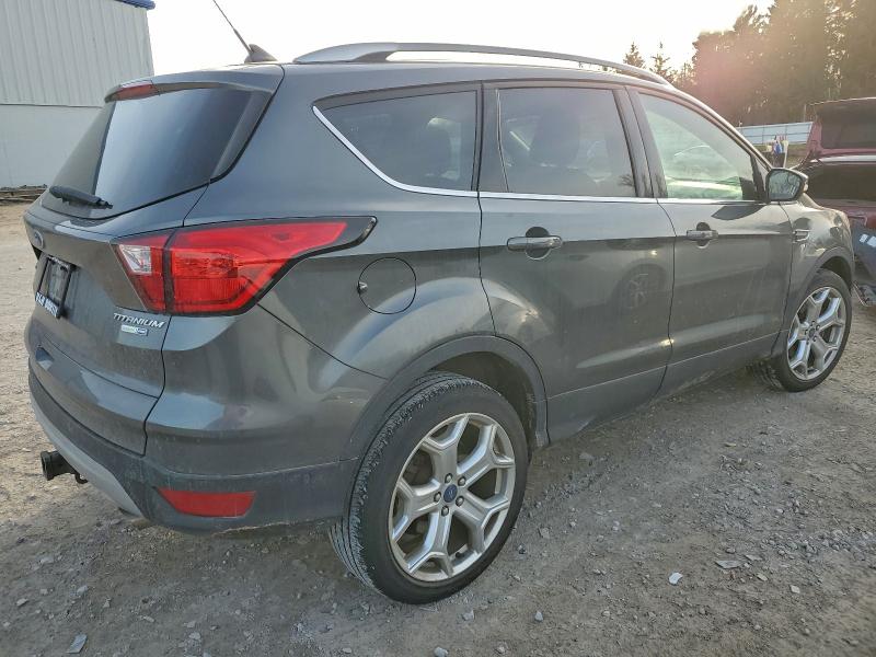 Photo 3 from auction – 2019 FORD ESCAPE TIT with VIN 1FMCU9J98KUB22874