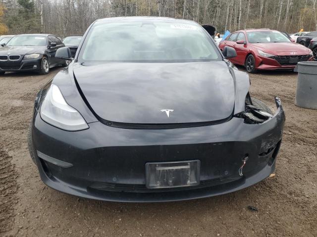 Photo 5 from auction – 2021 TESLA MODEL 3 with VIN 5YJ3E1EA4MF062126