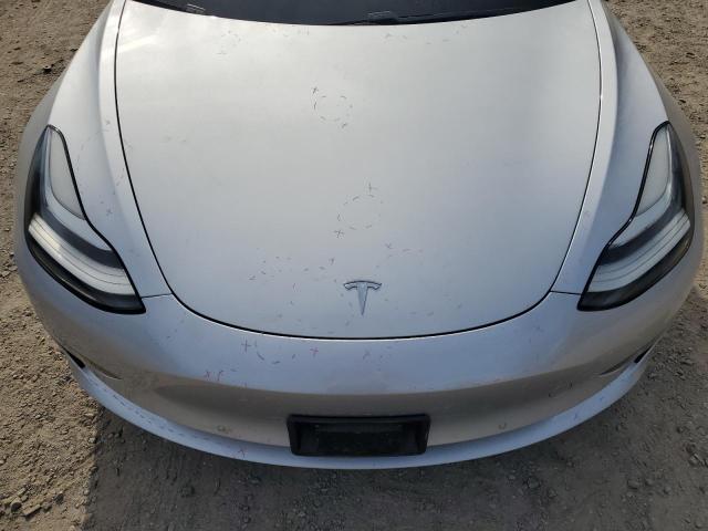 Photo 11 from auction – 2018 TESLA MODEL 3 with VIN 5YJ3E1EB7JF054476