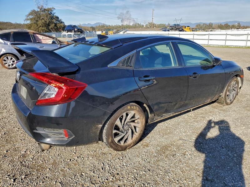 Photo 3 from auction – 2018 HONDA CIVIC EX with VIN 2HGFC2F74JH576156