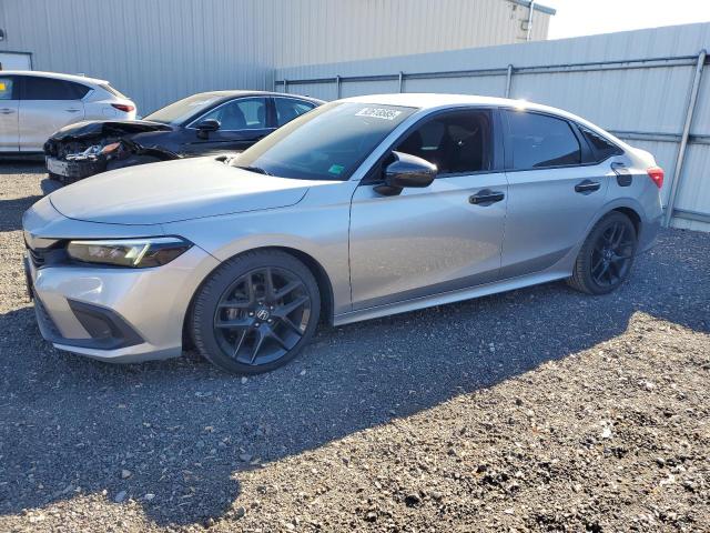 HONDA CIVIC SPOR 2022 with VIN 2HGFE2F59NH578564 - Photo from auction