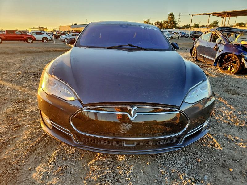 Photo 5 from auction – 2014 TESLA MODEL S with VIN 5YJSA1H2XEFP62763