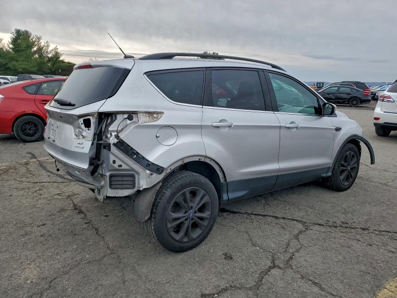 Photo 3 from auction – 2018 FORD ESCAPE SE with VIN 1FMCU0GD2JUB34282