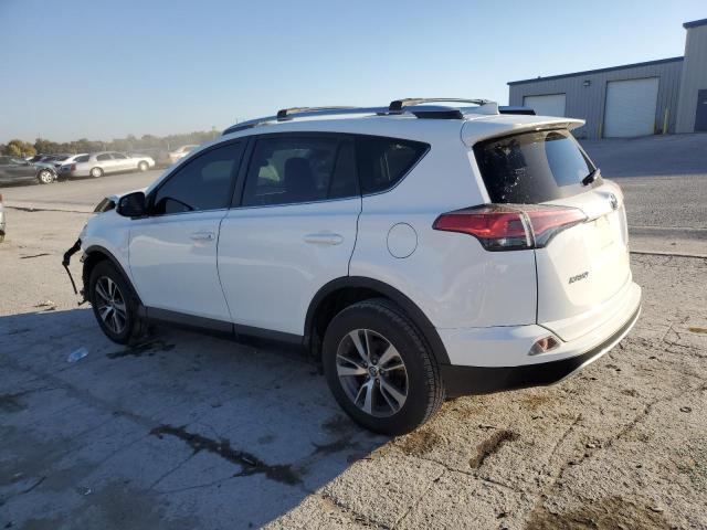 Photo 2 from auction – 2016 TOYOTA RAV4 XLE with VIN 2T3RFREV0GW435346