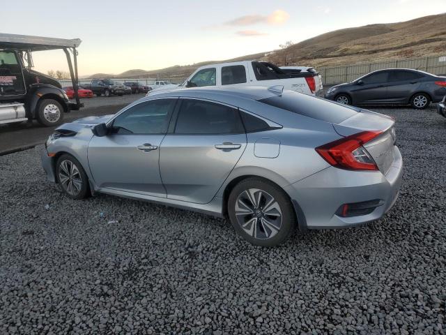 Photo 2 from auction – 2016 HONDA CIVIC EX with VIN 19XFC1F32GE036461