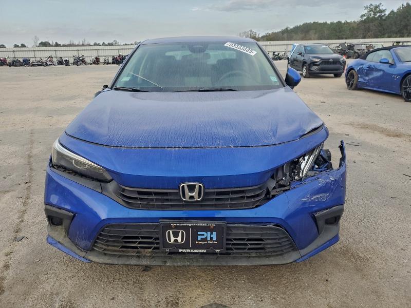 Photo 5 from auction – 2022 HONDA CIVIC LX with VIN 2HGFE2F24NH528497