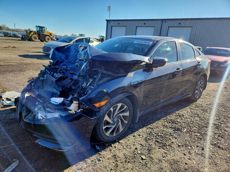 Photo 1 from auction – 2018 HONDA CIVIC EX with VIN 19XFC2F77JE021163