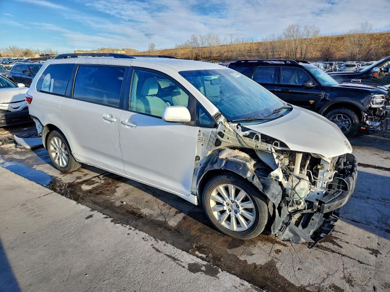 Photo 4 from auction – 2015 TOYOTA SIENNA LE with VIN 5TDJK3DC3FS099519